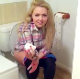 A beautiful Scottish girl is seen sitting on a toilet after taking her shit. She is visibly upset by being video-recorded and chases the videographer out of the bathroom. Complaints about the smell are heard.